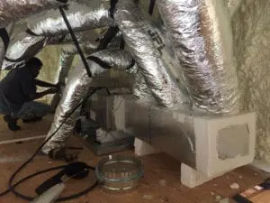 A bunch of duct work is in the corner